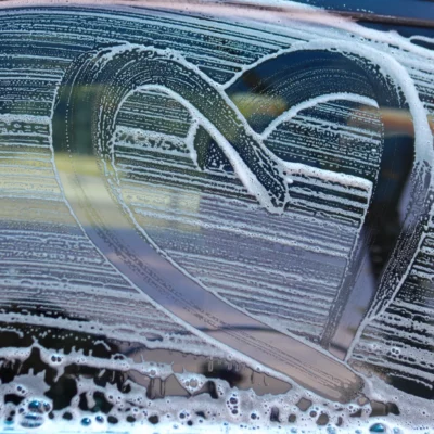 Soapy window of car in a Tidal Wave Auto Spa Car Wash